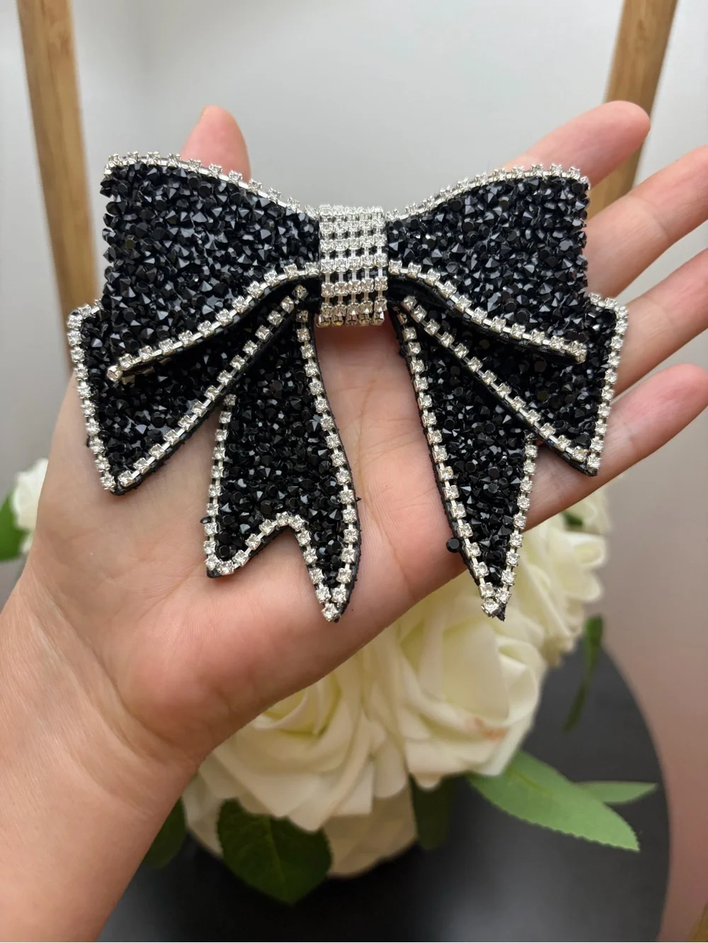 Black Crystal Bow Brooch with Silver Rhinestone Trim